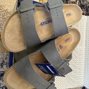 Birkenstocks; brand new.